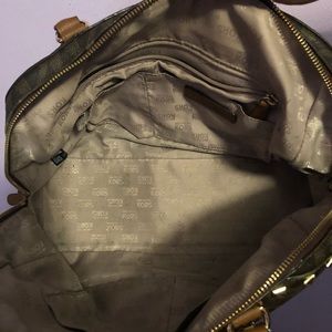 Michael Kors Brown Hand Bag. Missing some studs